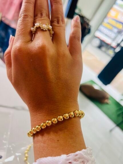Pulsera rodio perlas doradas