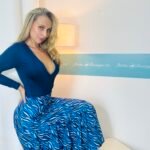 Body azul marino escote cruzado — manga larga y elegante