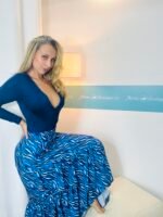 Body azul marino escote cruzado — manga larga y elegante