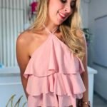 Blusa palo de rosa con boleros y anudo en el cuello